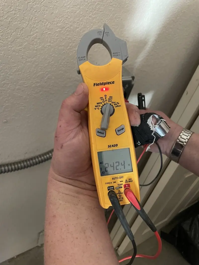 Voltage testing with clamp meter during Aluminum Wiring Replacement in Leicester